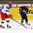 LUCERNE, SWITZERLAND - APRIL 16: USA's Joseph Masonius #2 makes a pass while Russia's Artyom Ivanyuzhenkov #12 defends during preliminary round action at the 2015 IIHF Ice Hockey U18 World Championship. (Photo by Matt Zambonin/HHOF-IIHF Images)


